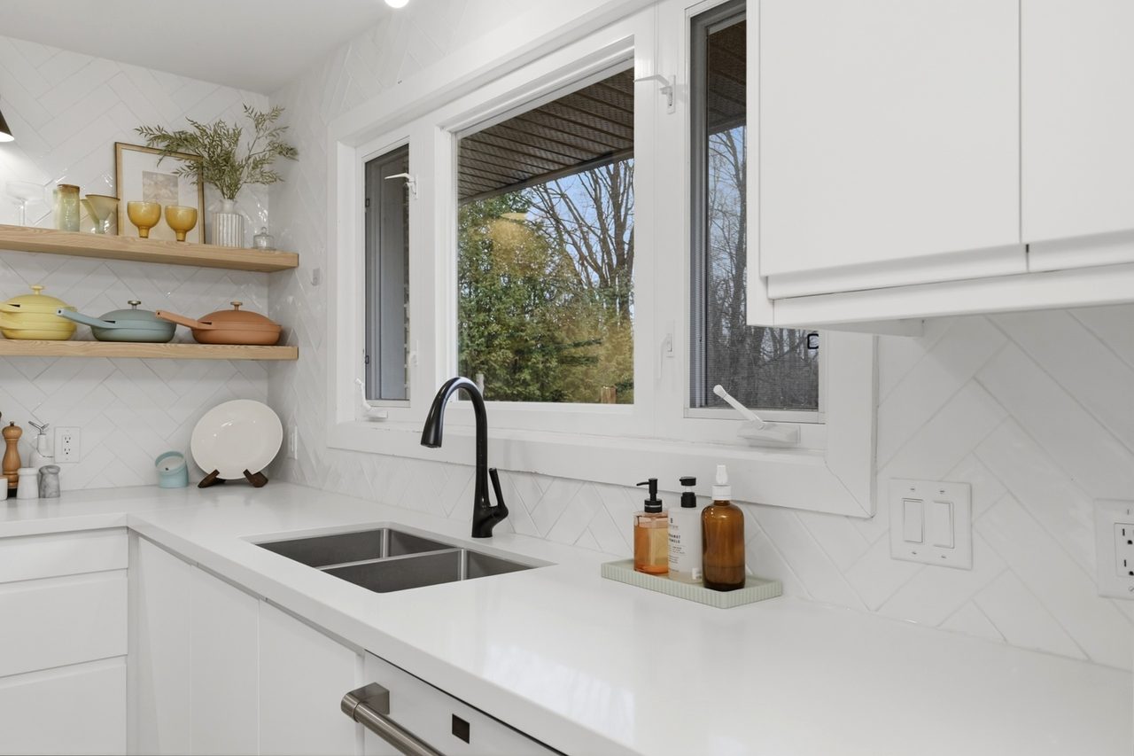 Bright kitchen with natural light finished by Koenig Painting and Design